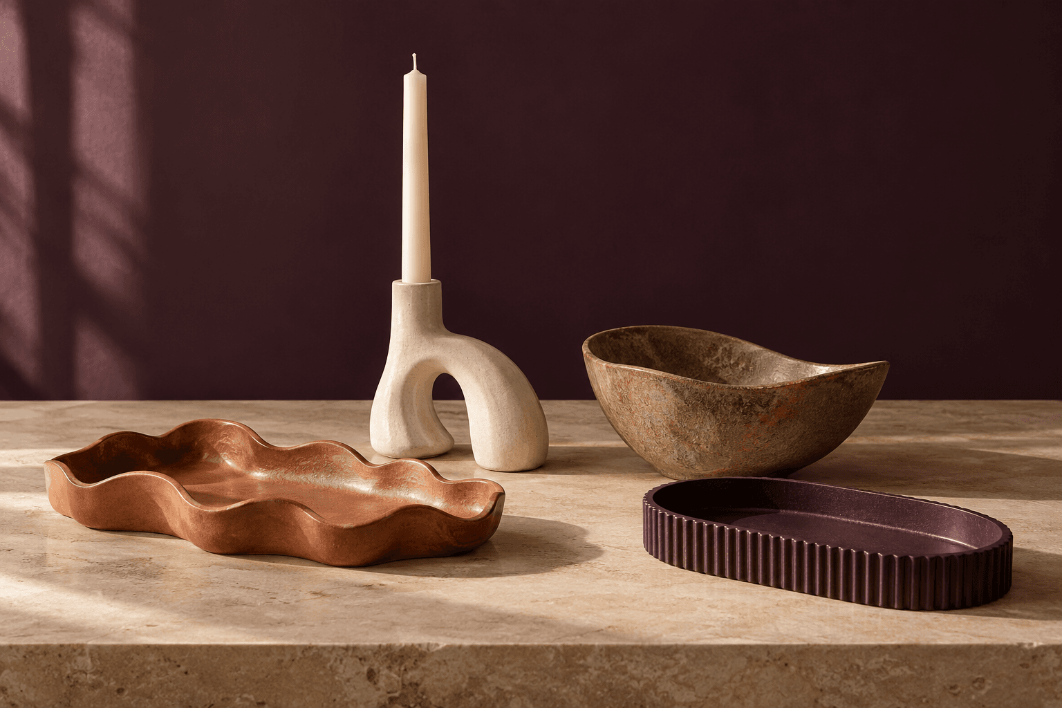 Sienna-coloured sculptural tray with a gently undulating rim